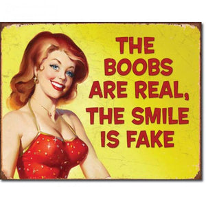 The Boobs are real the smile is fake